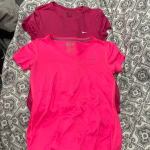 A bundle of nike workout shirts